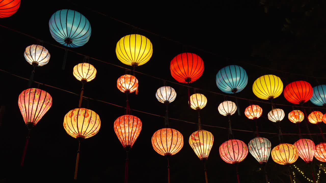 Vibrant collection of traditional lanterns Hoi An festival at night Vietnam