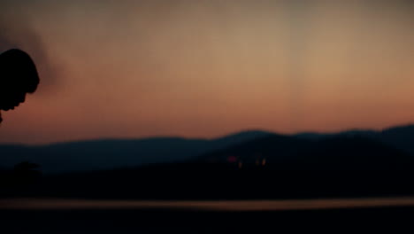 silhouette of person at sunset