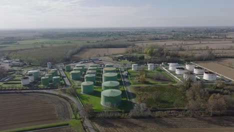 aerial view of steel round oil storage tanks, storage and handling services for petroleum products