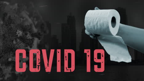 a hand is holding a toilet paper roll near a picture of a virus with the name covid19