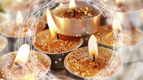 Animation-of-lit-christmas-tea-candles-and-circles-spinning