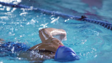 swimmer training in a swimming pool