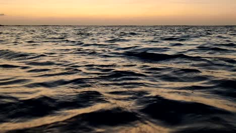 quiet-sea-ripples-at-sunset