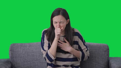 Sick-Indian-girl-suffering-from-cold-and-cough-Green-screen