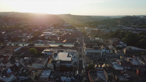 Aerial flyover: Medieval Exeter Cathedral in late afternoon, Devon UK