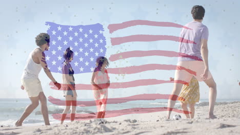 animation of flag of usa over happy diverse friends playing ball on beach in summer