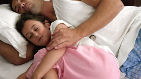 dad and daughter sleeping