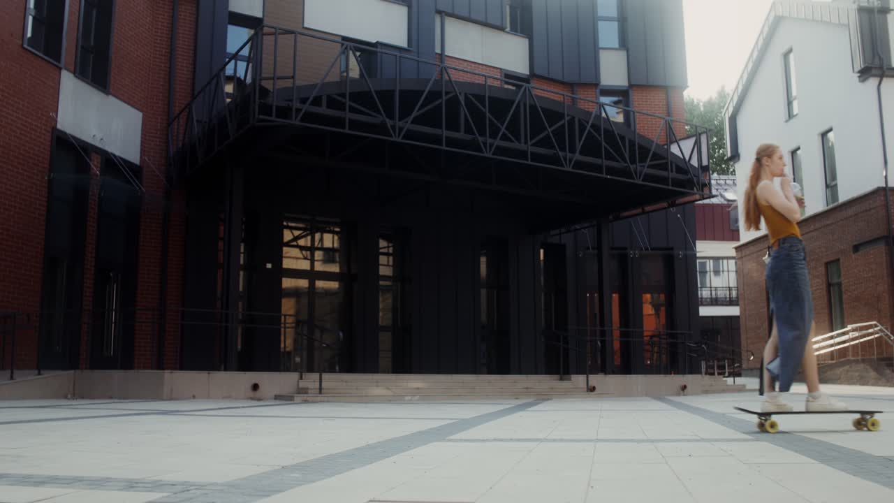 Young Woman Skateboarding in a City Plaza