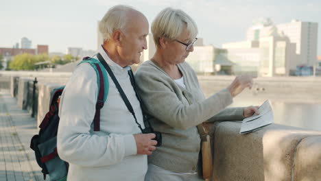 senior couple exploring a city