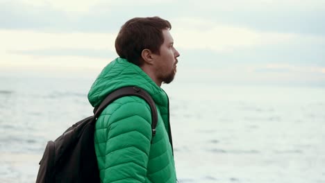 man walking on the beach