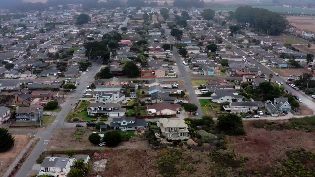 Aerial: Half Moon Bay Beach Neighborhood. Flying Forward