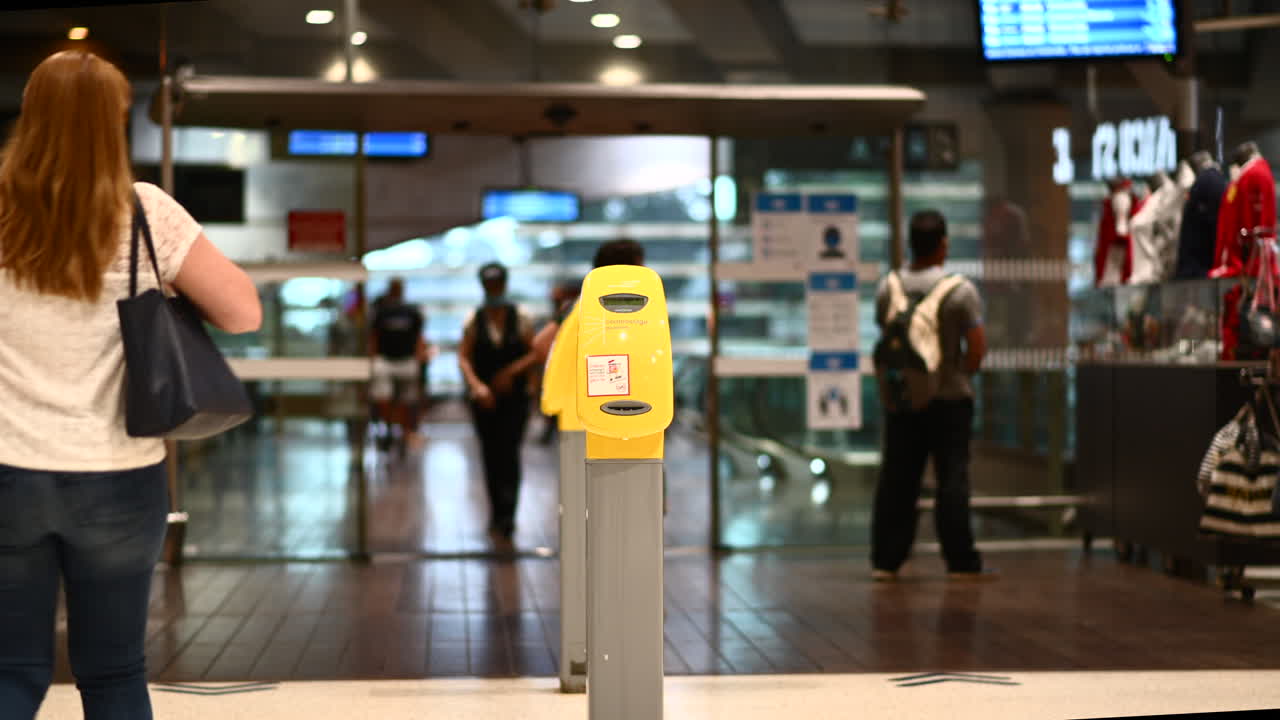 People at the Monte Carlo train station in Monaco