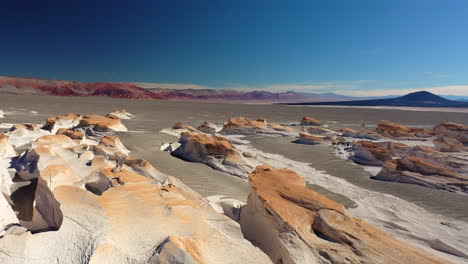 Dolly-Forward-Campo-Piedra-Pomez-Catamarca-Argentina,-Pumice-field,-Unique-Lanscape,-Volcano-Ocher-Moutains-Blue-sky