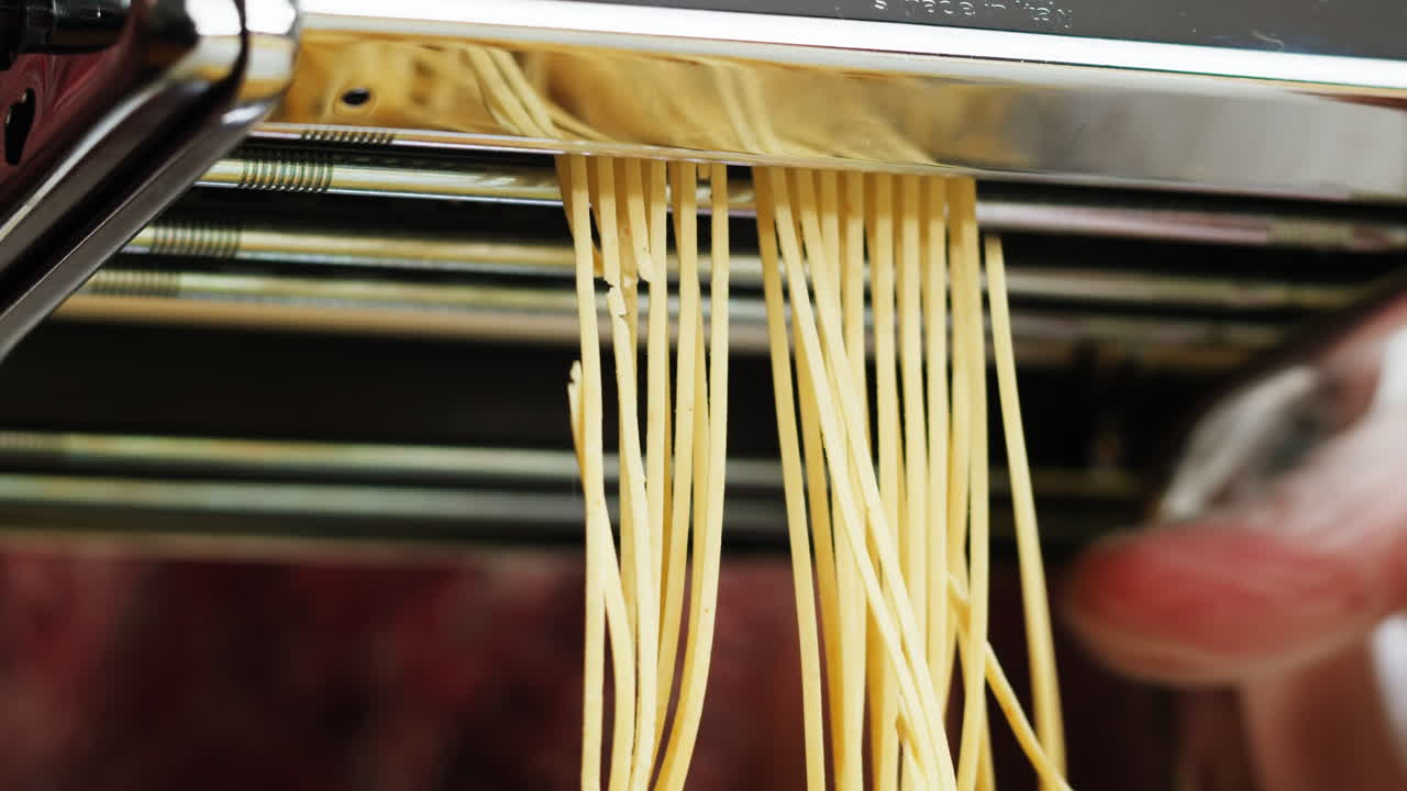Close-up of Fresh Pasta Being Made by a Machine