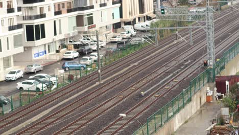 train view in a station with time-lapse buildings