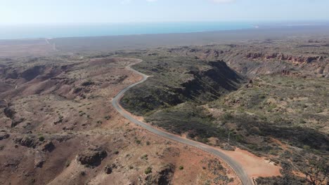 Drone-aerial-pan-up-and-moving-down-over-Charles-knife-gorge