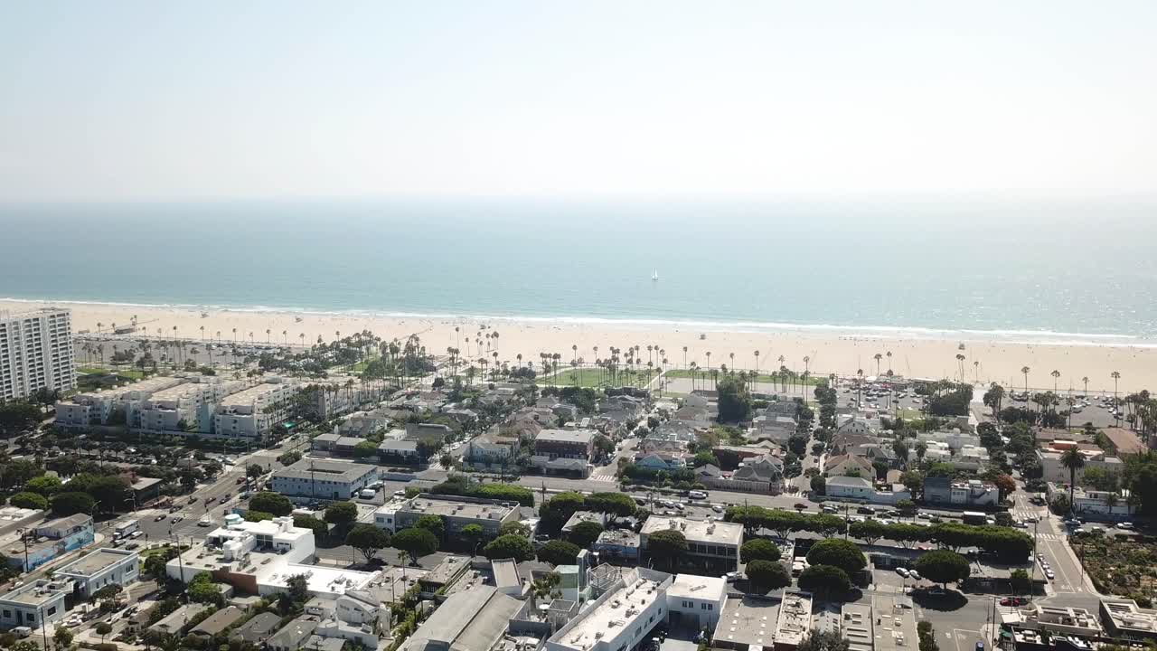 Los Angeles Aerial view heading towards waterfront beach neighbourhood skyline