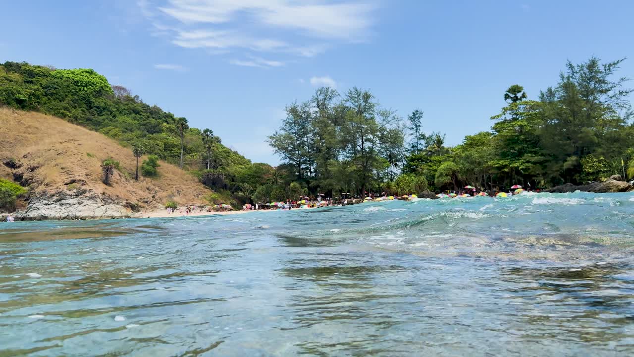 Underwater exploration at Yanui Beach, showcasing clear waters and vibrant marine life in a tropical setting