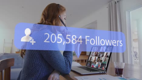 Animation-of-speech-bubble-with-number-of-followers-growing-over-woman-using-laptop-on-video-call