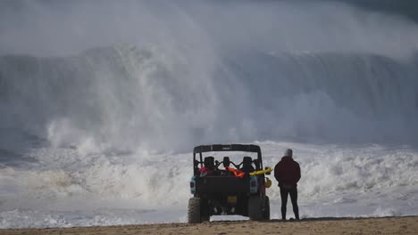 slow motion of a wave break on the beach in nazaré, portugal