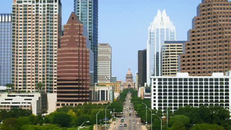 aerial drone view from congress avenue bridge toward texas capitol building in downtown austin, drone 4k