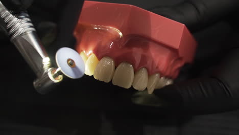 demonstration of dental composite polishing - eye level detail closeup