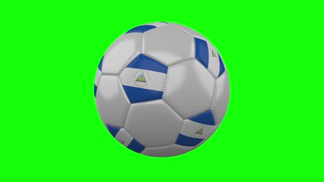 soccer ball with nicaragua flag on green chroma key, loop