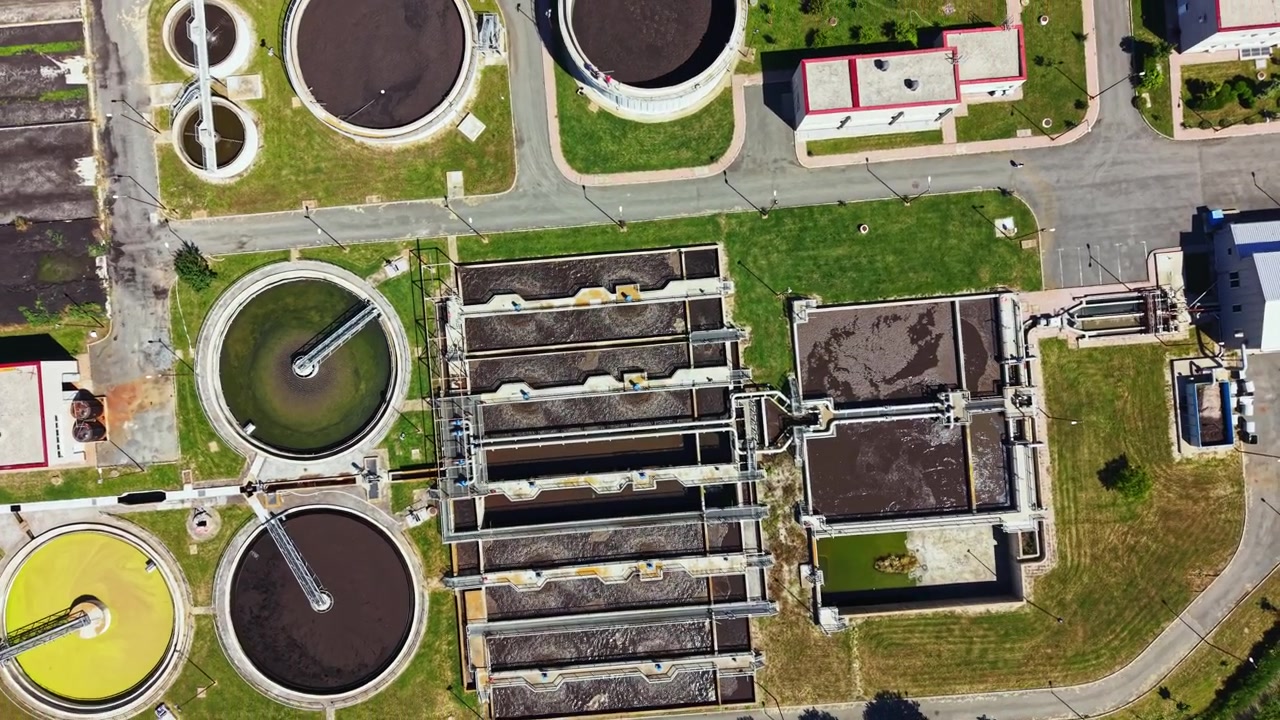 Facilities for water treatment processing at a wastewater treatment plant located in an urban area during daylight hours