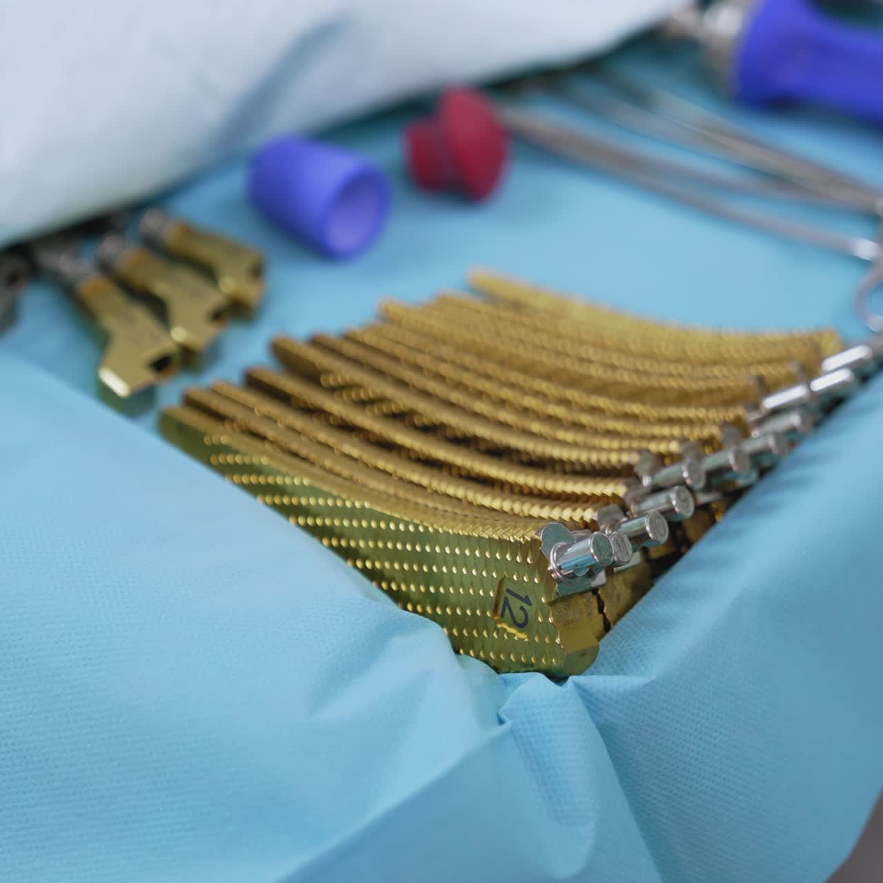 Set of instruments on a surgical table. Details of the operating room. Prepared clean medical instruments, devices for a surgery