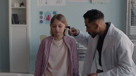 a girl getting a medical exam