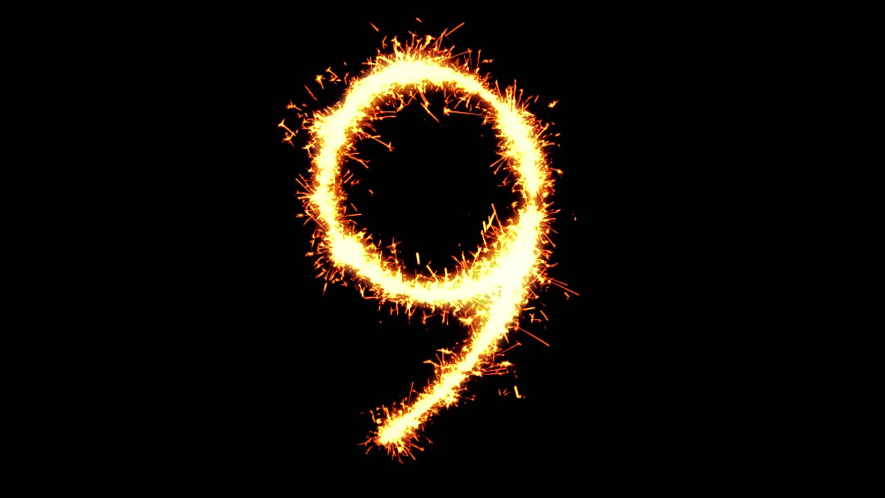 Number 9 text sparkler writing with glitter sparks particles firework on black 4k loop background