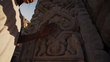 woman meditating in front of the colosseum