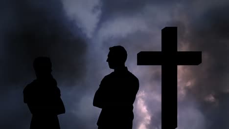 animation of silhouette of couple over clouds and cross