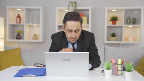 home office worker man having a heart attack.