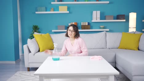 meticulous young woman cleaning her dirty house. germ, bacteria concept.