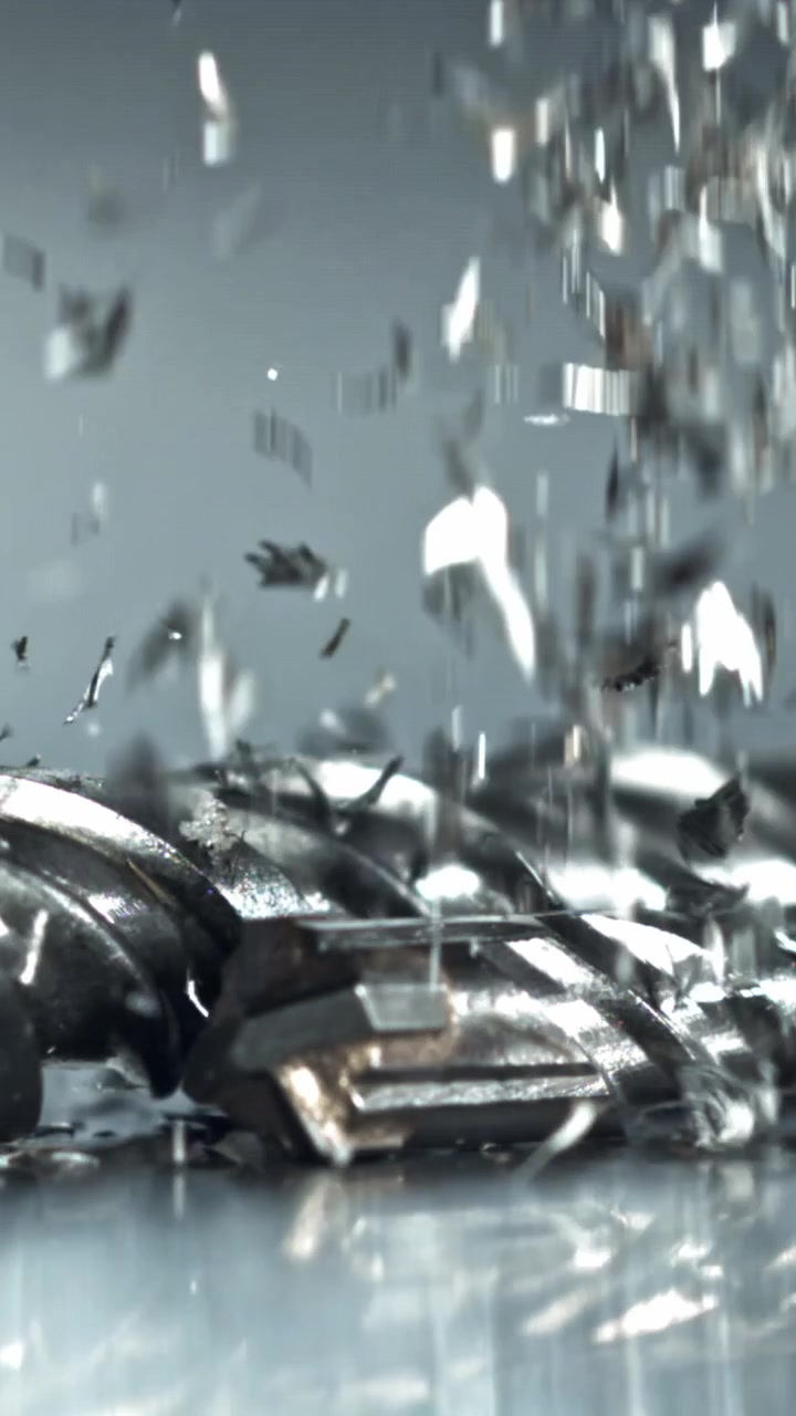 Macro Shot of Metal Shavings Falling onto a Drill Bit
