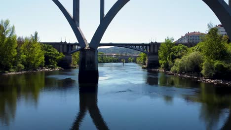 Low-angle-view-of-bridges-crossing-the-Miño-river,-Ourense