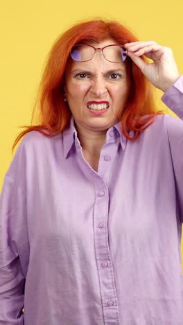 woman expressing confusion and shock with glasses