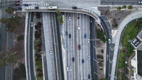top down drone shot above traffic on interstate 110, in downtown los angeles, usa