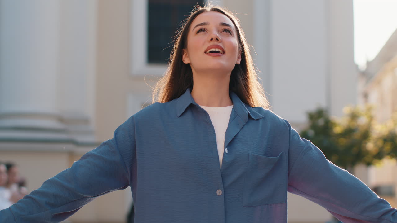 Young woman taking a deep breath of fresh air relaxing taking a break resting meditating outdoor