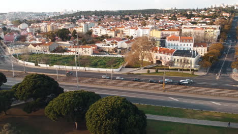 aerial rotating view of a residential area on the opposite side of torre bellem in lisbon, portugal