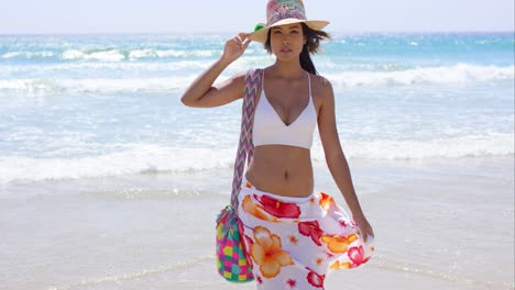 Sexy-young-woman-posing-on-a-tropical-beach