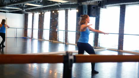 Ballerina-practicing-in-front-of-mirror