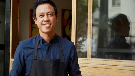 waiter with donuts standing at outdoor cafe 4k