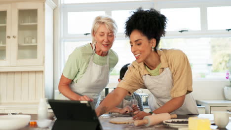 Talking,-tablet-and-family-with-baking-help