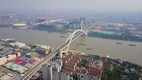 china day time shanghai cityscape traffic lupu bridge riverside aerial panorama 4k