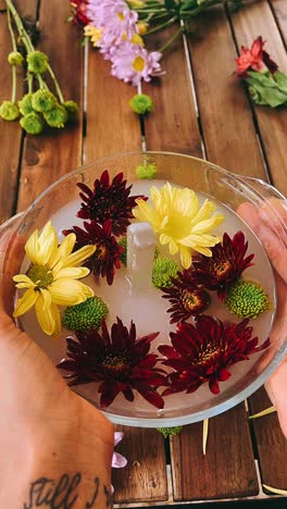 floral arrangement in a glass bowl with crystal