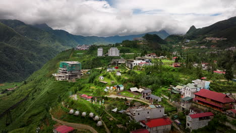 sapa town hillside hotels and resort buildings, ha giang loop, drone shot