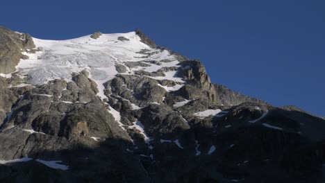 Snow-Rock-Mountains-Over-Joffre-Lakes-Provincial-Park-In-Pemberton,-British-Columbia,-Canada