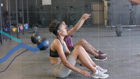 Animación-Del-Procesamiento-De-Gráficos-Sobre-Diversos-Entrenamientos-Cruzados-De-Hombres-Y-Mujeres-Con-Balones-Medicinales-En-El-Gimnasio